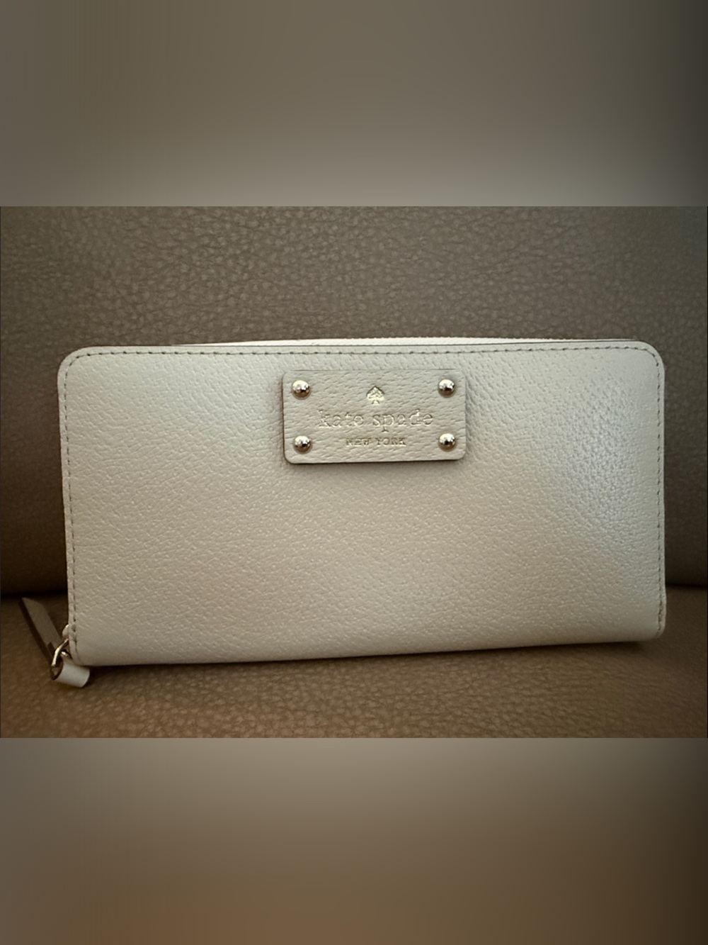 kate spade Pebbled Cream Zip-Around Wallet